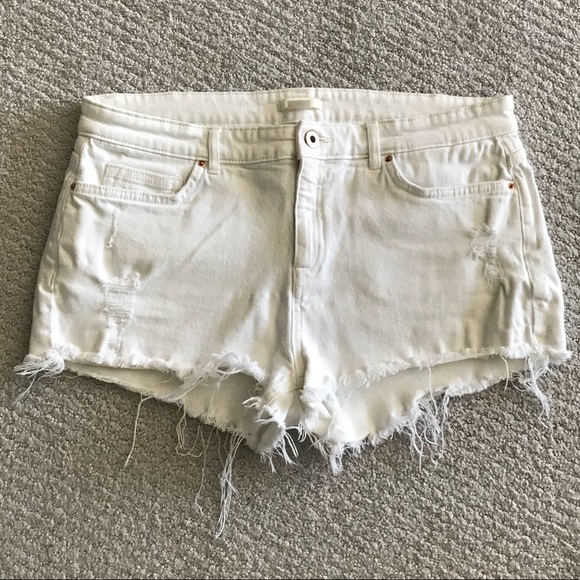destroyed white denim shorts